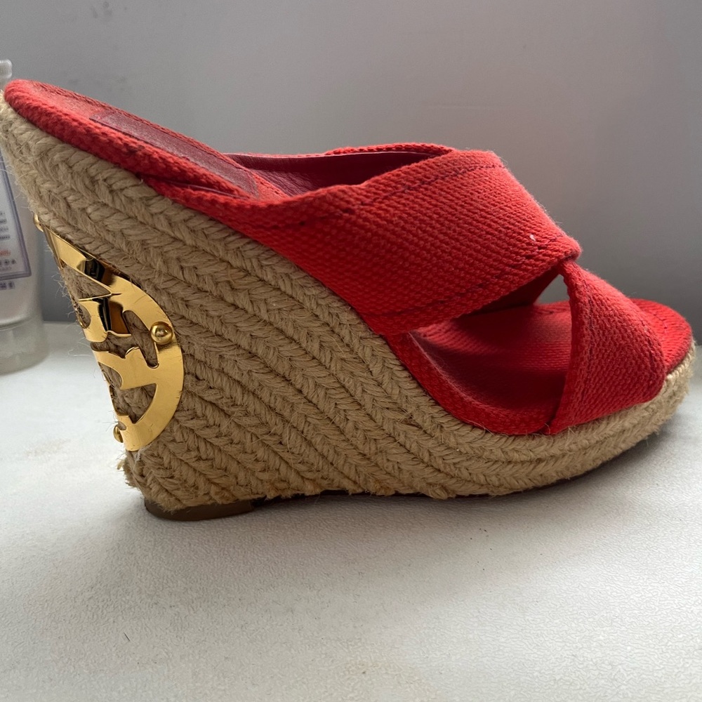 Slightly used Tory Burch orange canvas wedges
